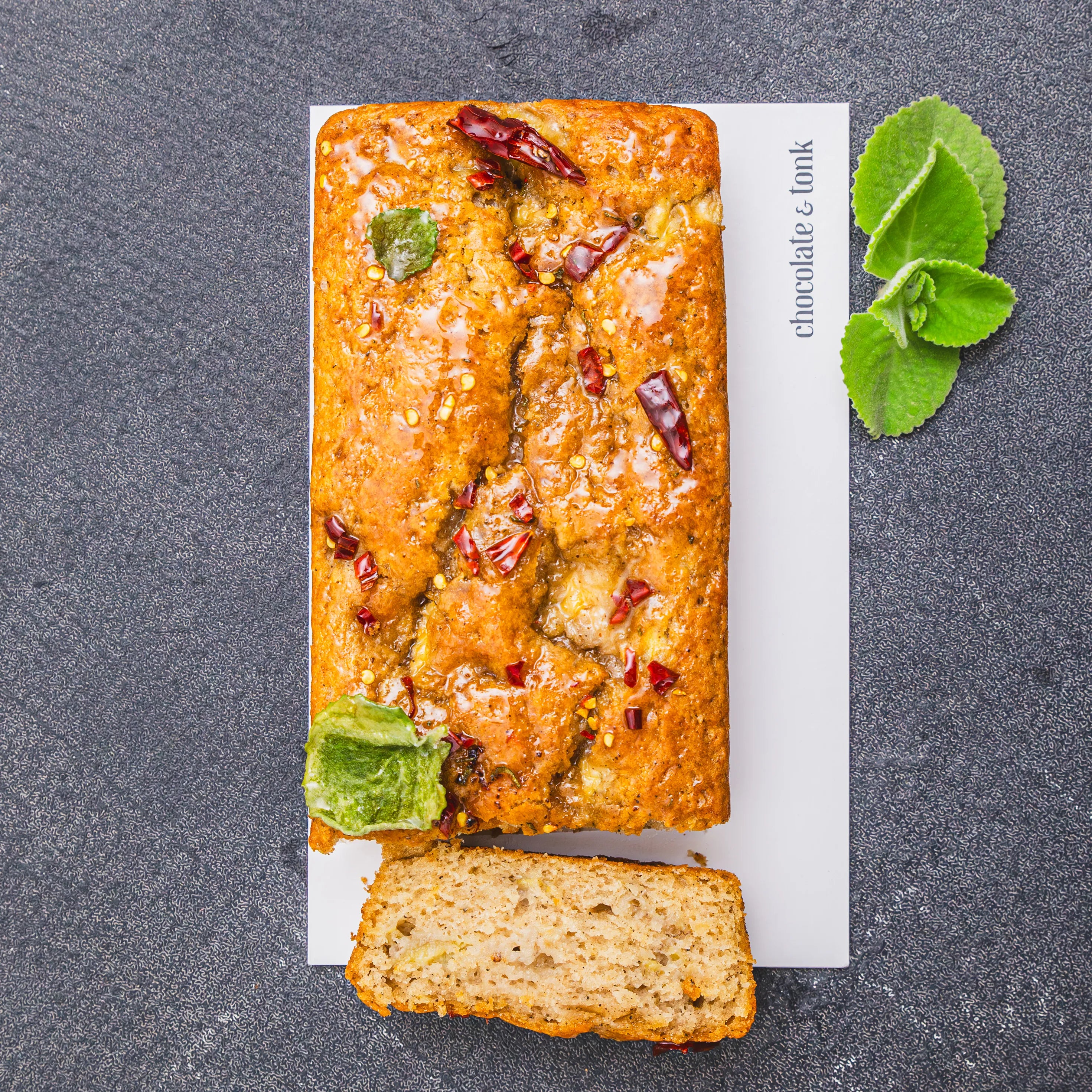 Unique banana bread loaf cake glazed with hot honey and spurflower