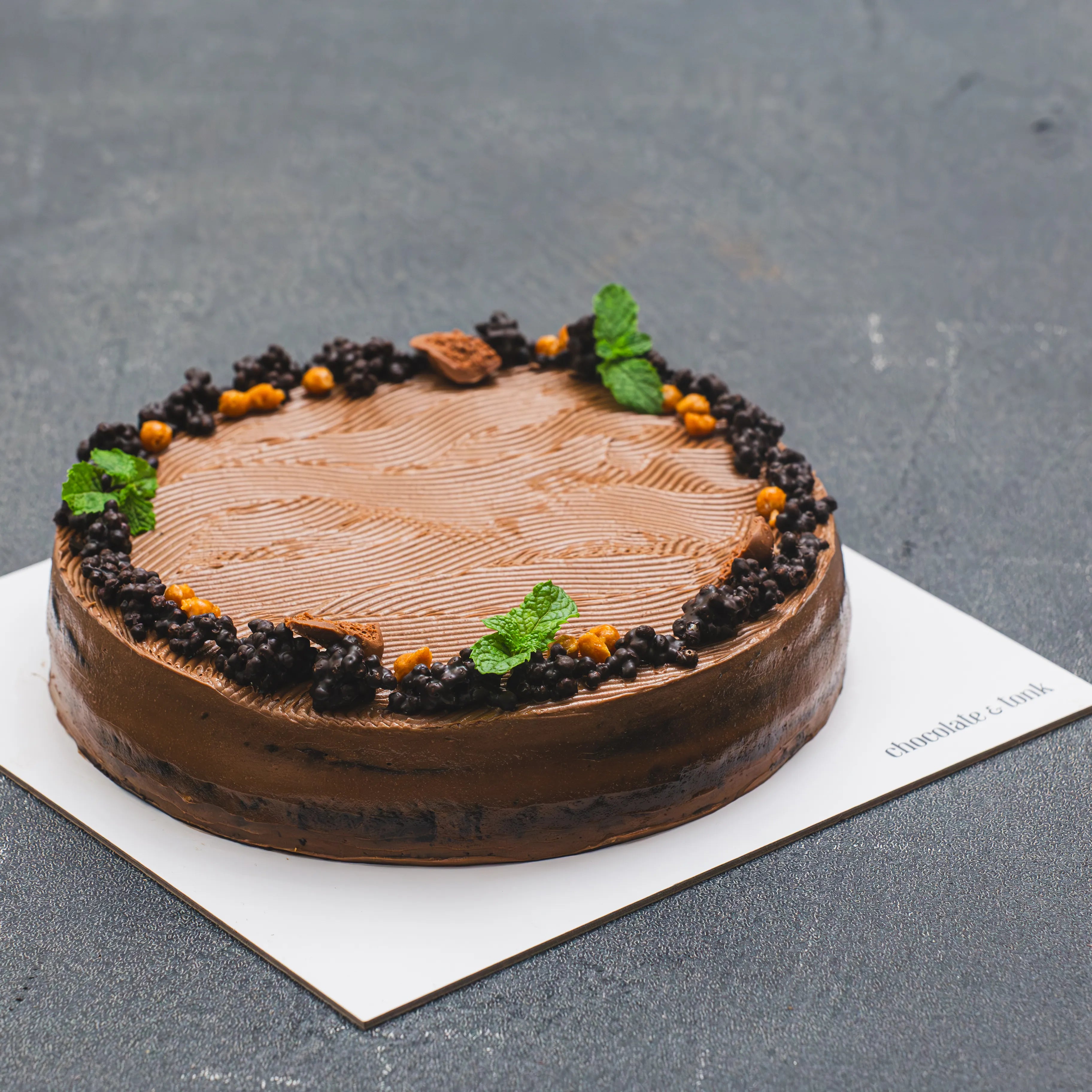 Chocolate cake with smooth and creamy chocolate buttercream frosting