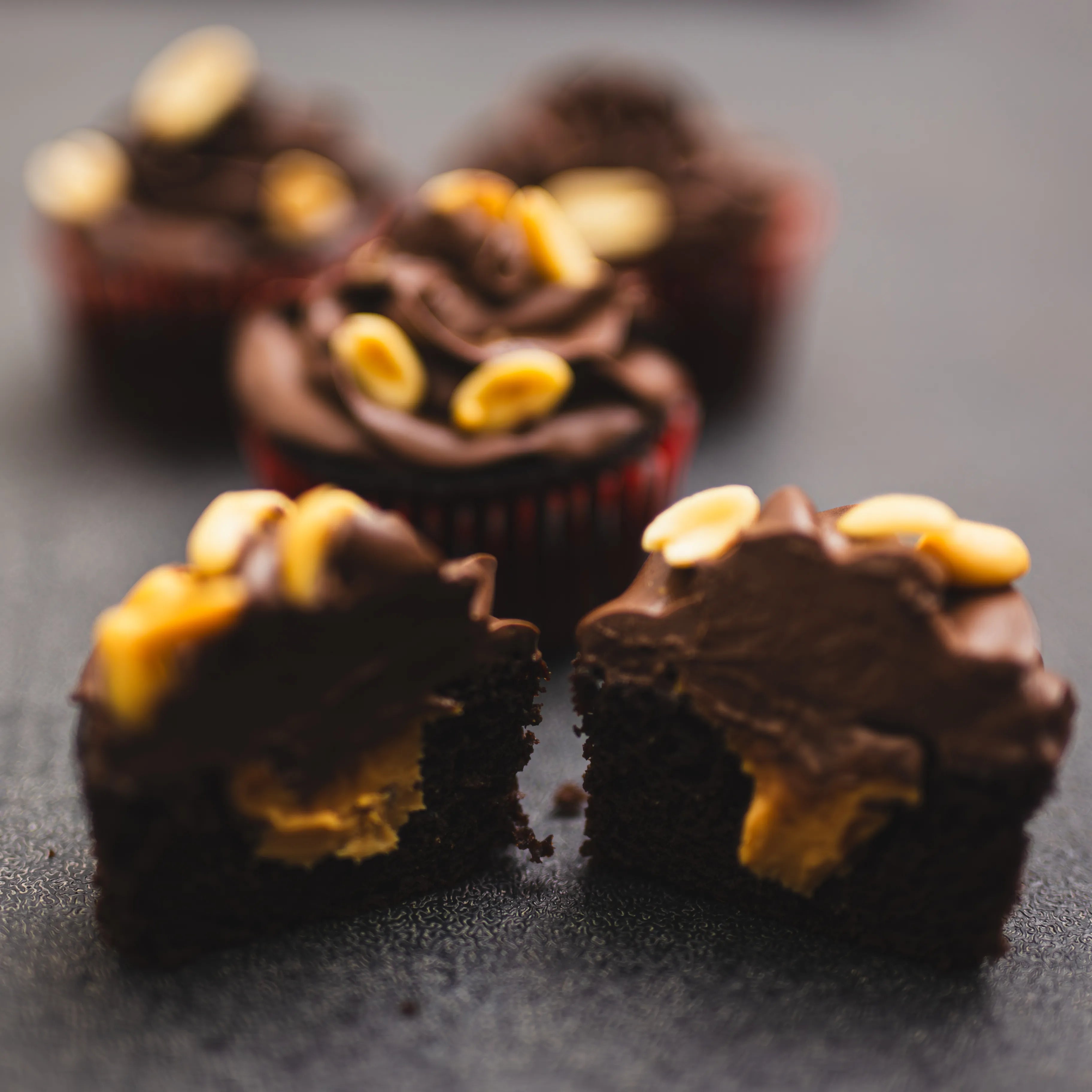 Moist chocolate cupcakes topped with creamy peanut butter frosting
