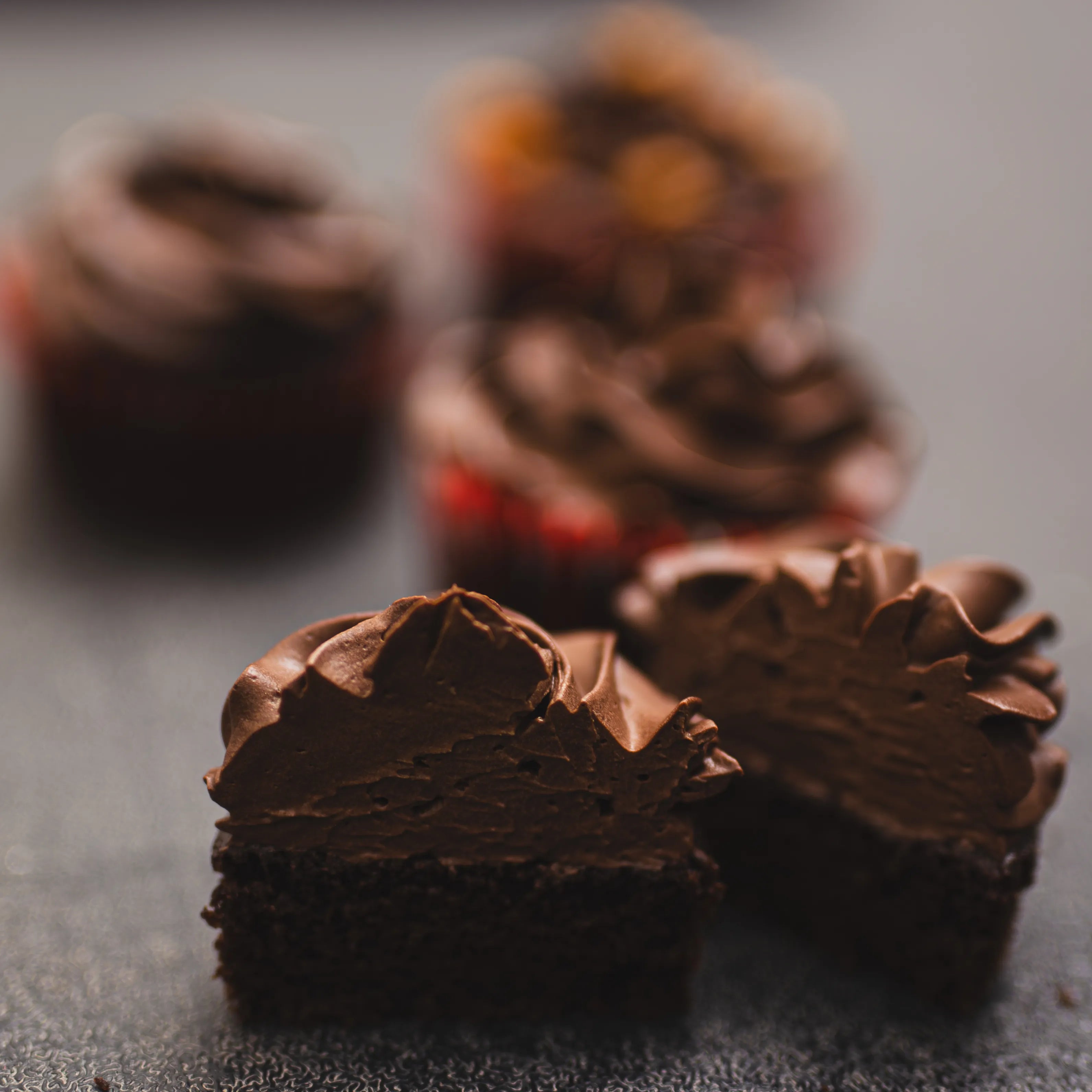 Moist chocolate cupcakes topped with chocolate coffee ganache