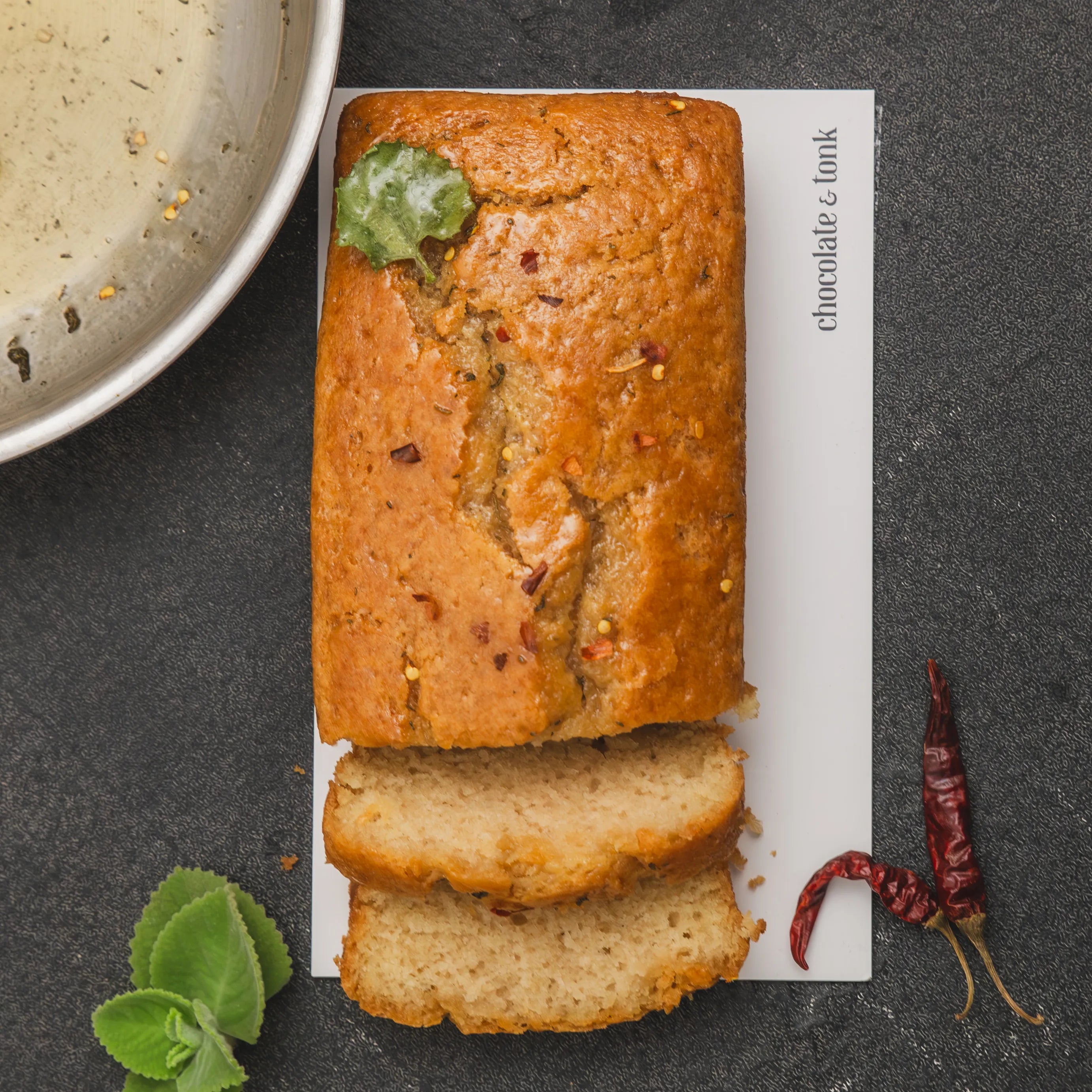 Vanilla loaf cake glazed with hot honey and spurflower